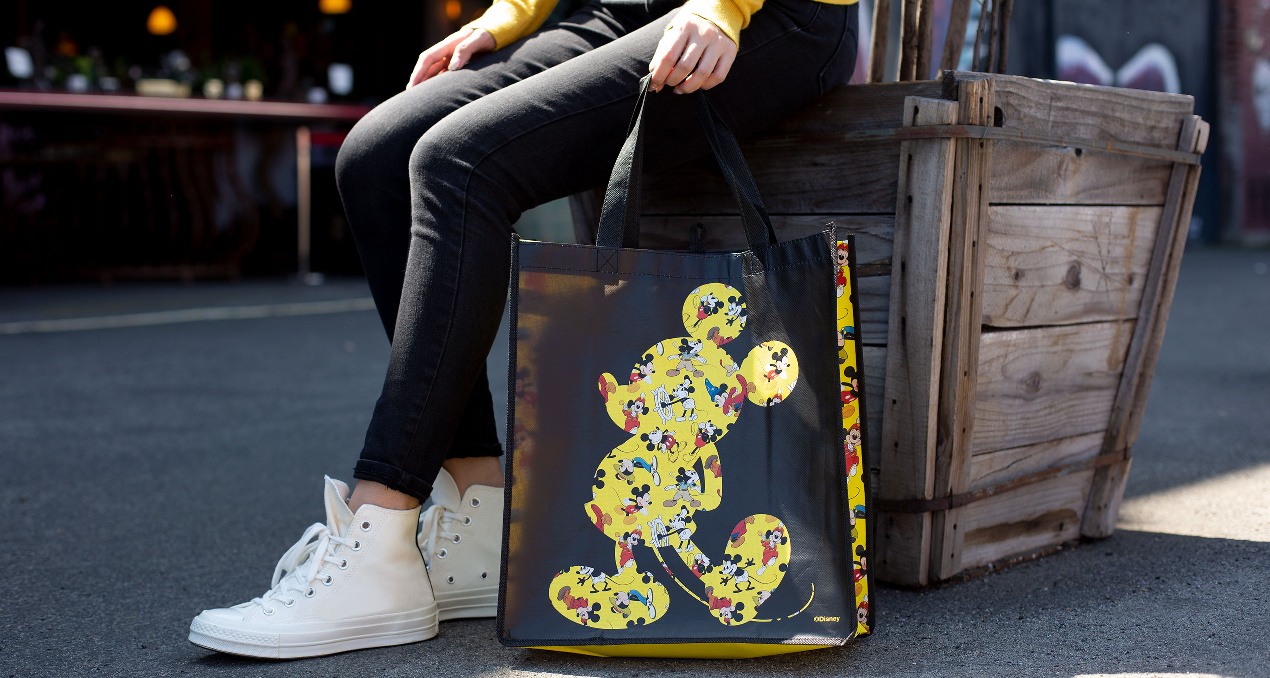 Woman Holding Reusable Mickey Mouse Bag